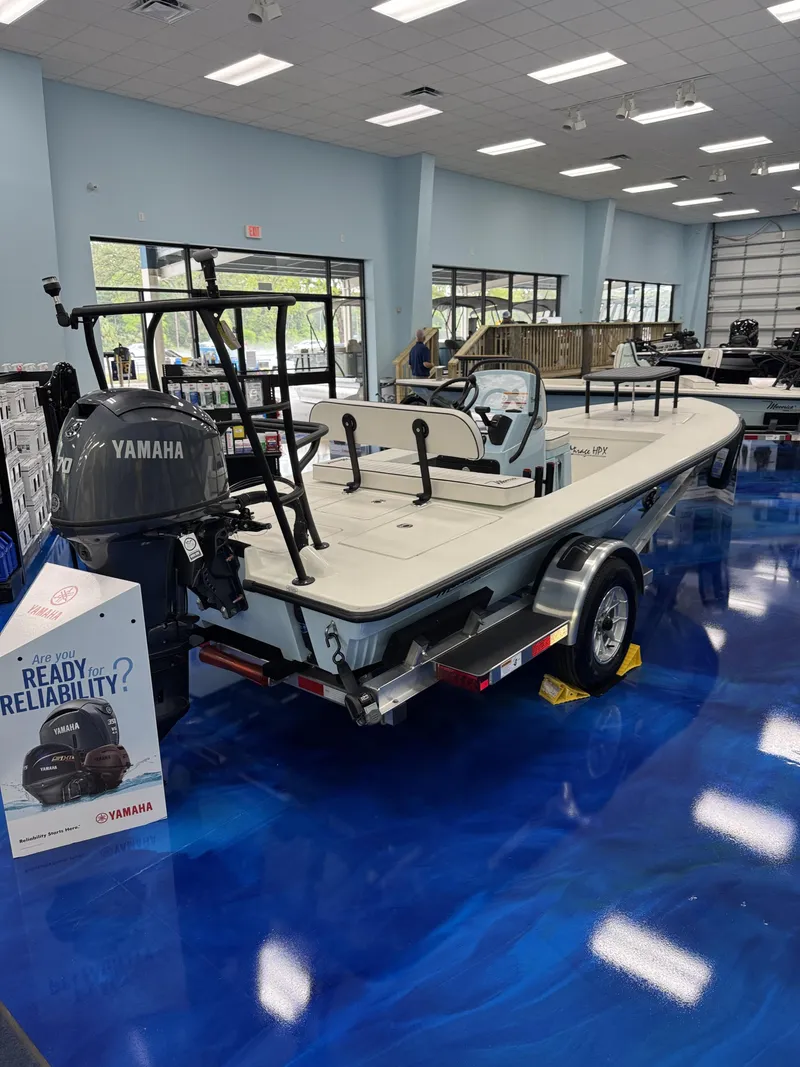 Slide: The Image of Maverick HPX-S 2026 boat in showroom with Yamaha engine. - 4