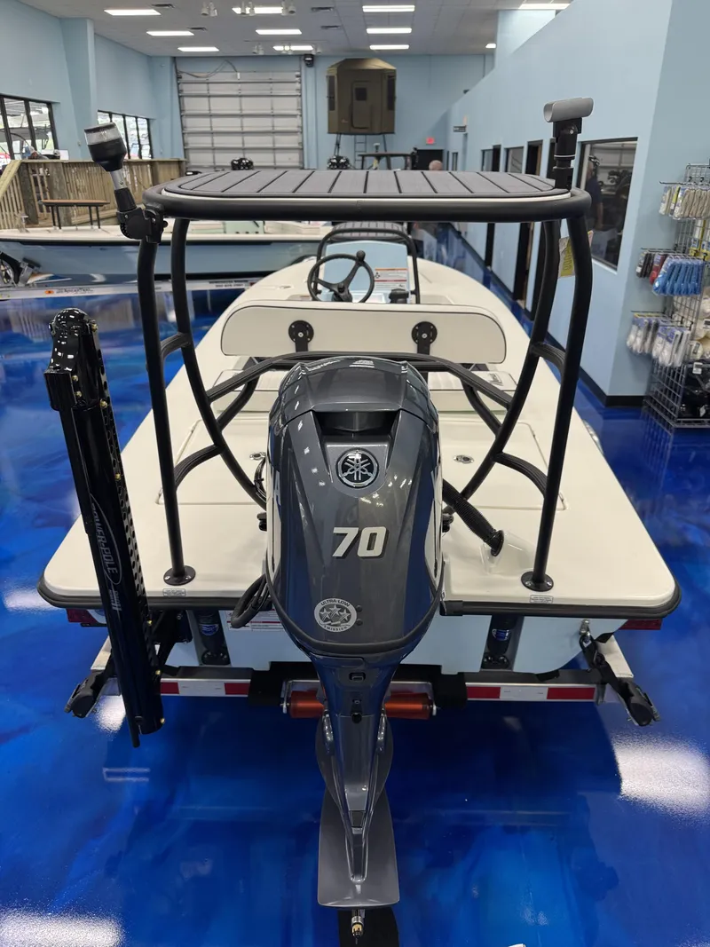 Slide: The Image of Maverick HPX-S 2026 boat with 70 HP engine in showroom. - 7