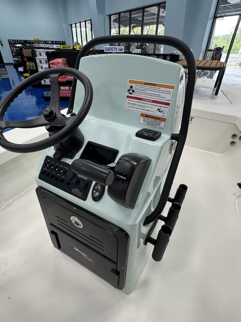 Slide: The Image of Maverick HPX-V 2026 boat console with steering and controls. - 10