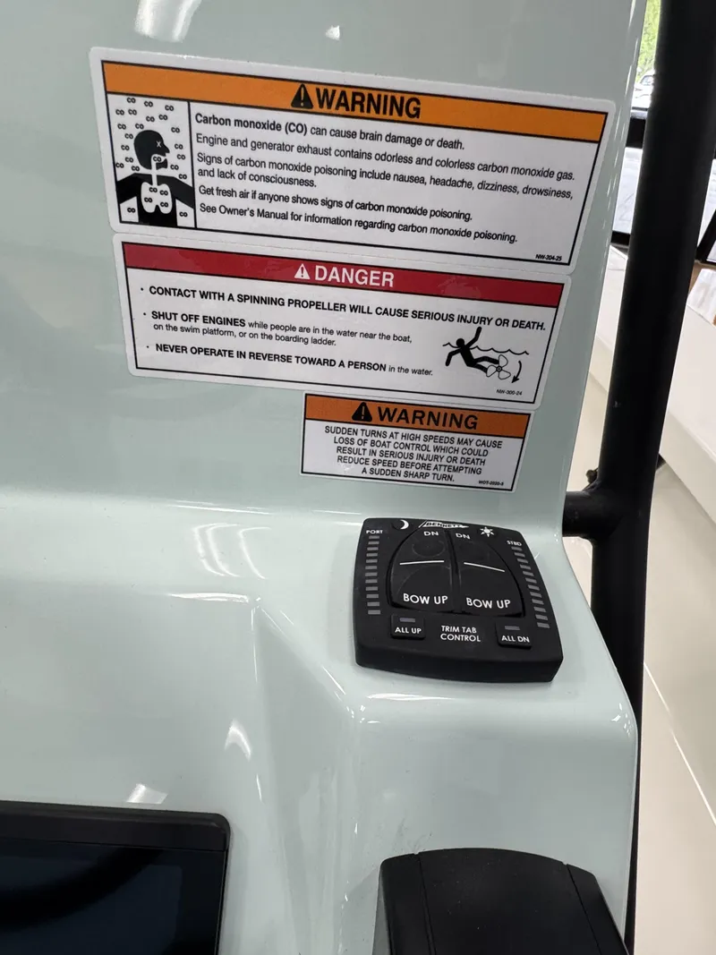 Slide: The Image of Warning labels and controls on Maverick HPX-V 2026 boat. - 11