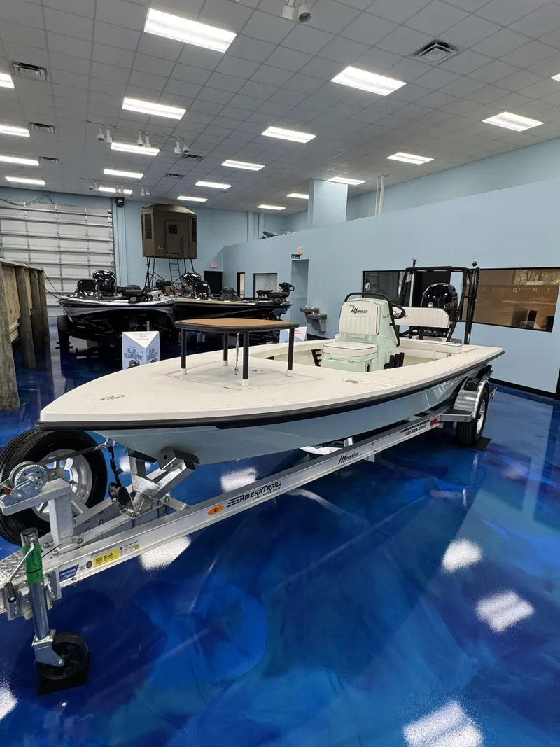 Slide: The Image of Maverick HPX-V 2026 boat in showroom on trailer. - 15