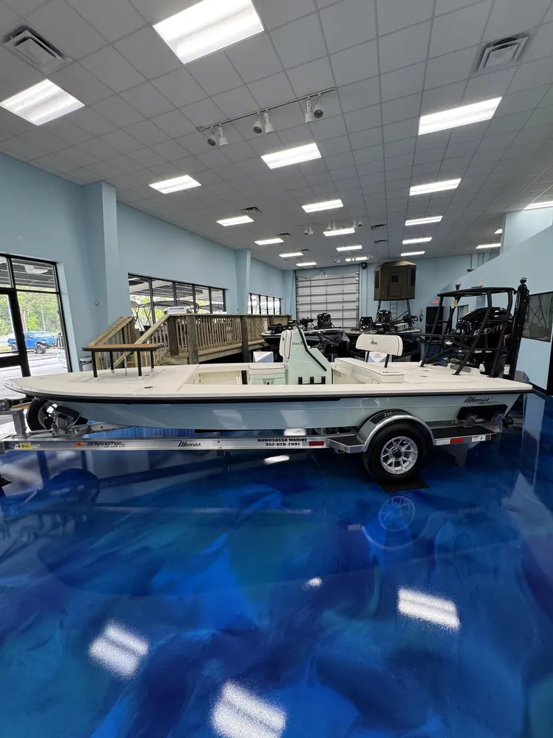 Slide: The Image of 2026 Maverick HPX-V boat in showroom on blue floor. - 16
