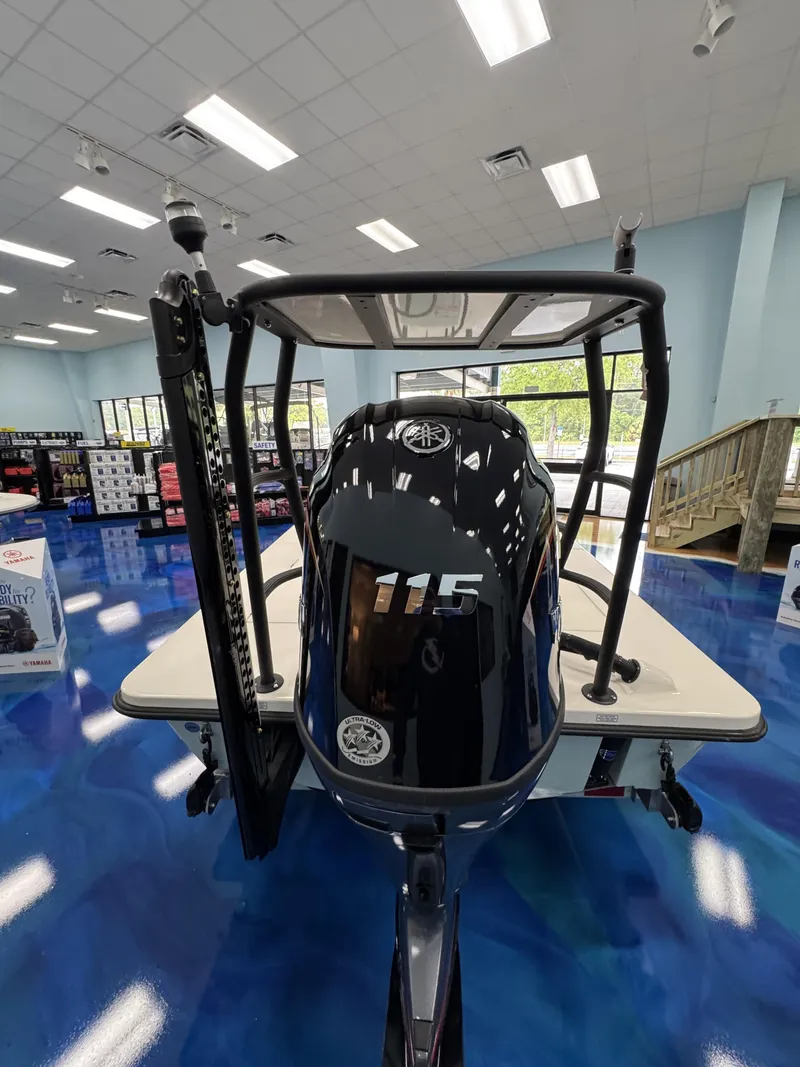 Slide: The Image of Maverick HPX-V 2026 boat with 115 HP engine in showroom. - 17