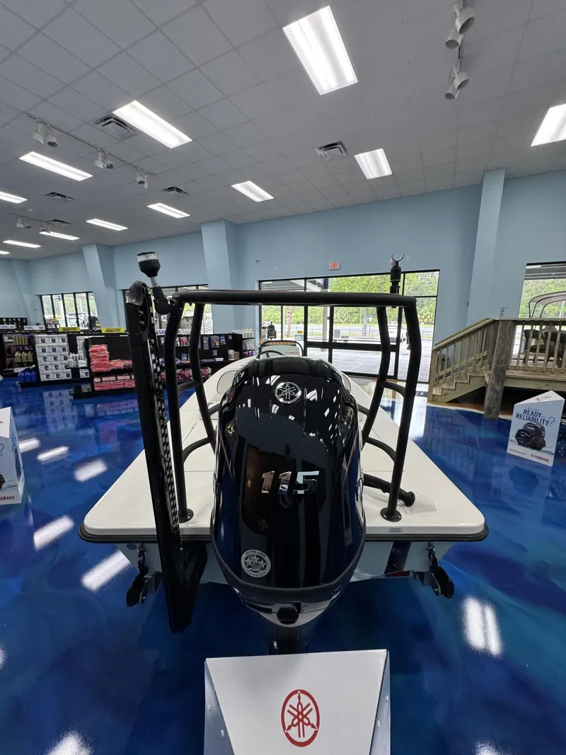 Slide: The Image of Maverick HPX-V 2026 boat in showroom with Yamaha engine. - 19