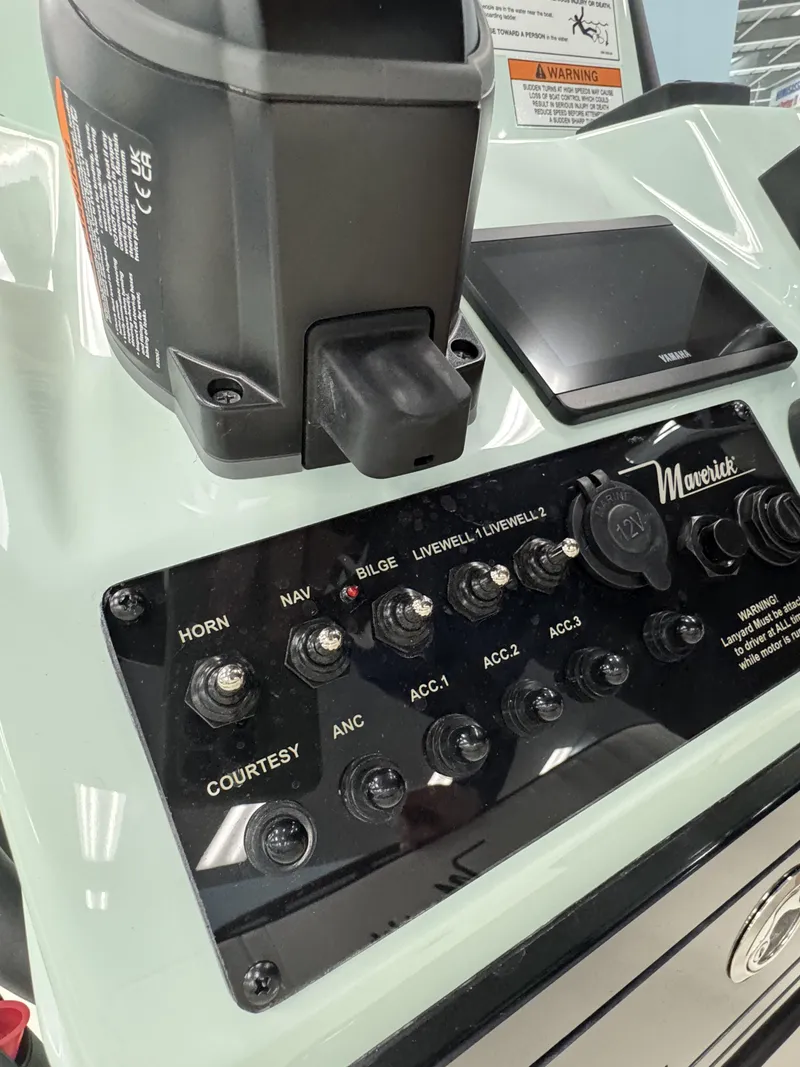 Slide: The Image of Control panel of a 2026 Maverick HPX-V with various switches. - 24