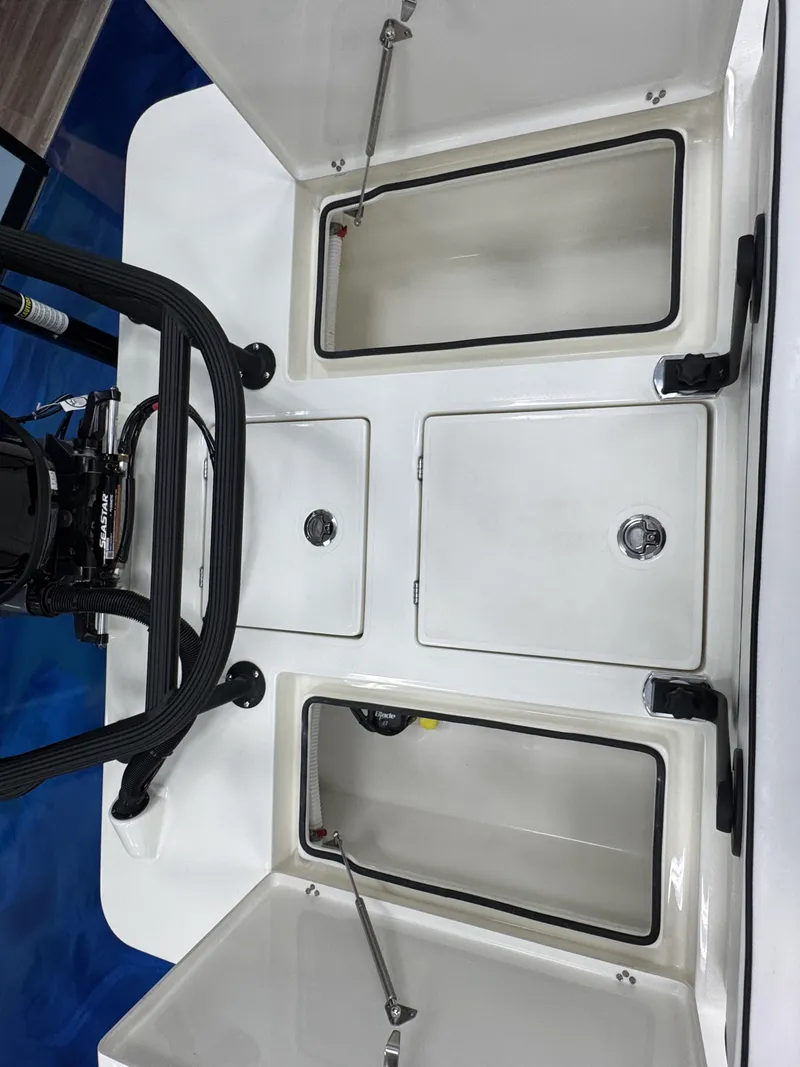 Slide: The Image of Interior view of Maverick HPX-V 2026 with open storage compartments. - 29