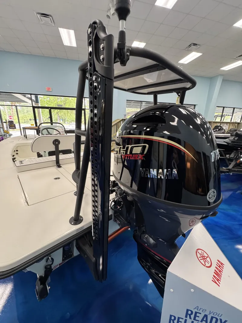 Slide: The Image of Maverick HPX-V 2026 with Yamaha outboard motor in a showroom. - 3