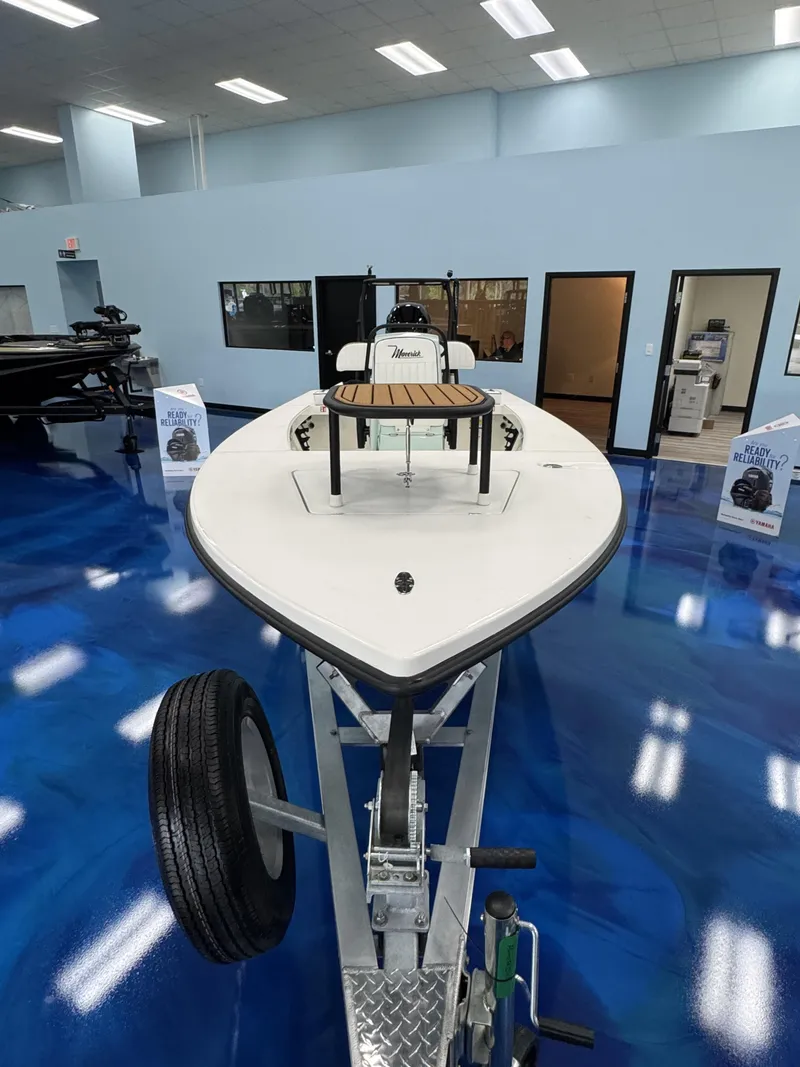 Slide: The Image of 2026 Maverick HPX-V boat in showroom on blue floor. - 5