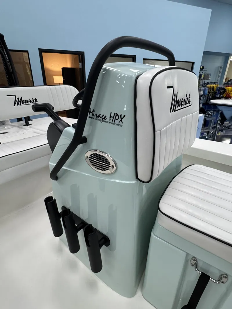 Slide: The Image of 2026 Maverick HPX-V boat console with white upholstery and grab handle. - 9