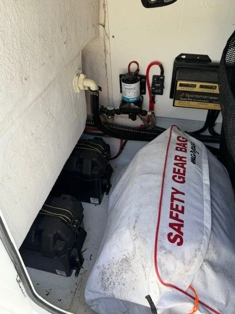 Slide: The Image of Interior of a 2022 Sportsman Masters 227 Bay Boat with safety gear. - 12