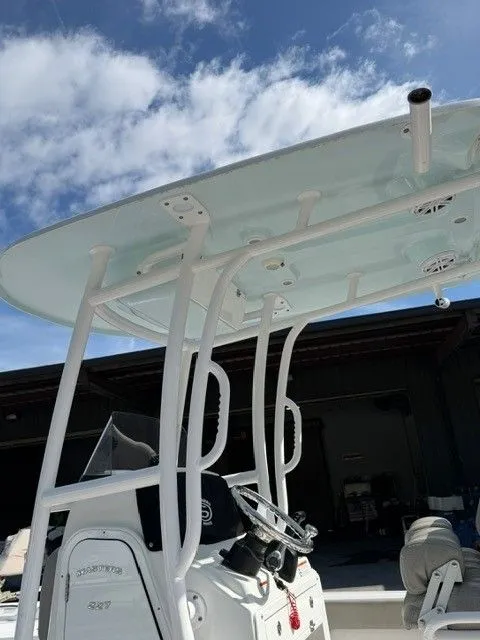 Slide: The Image of 2022 Sportsman Masters 227 Bay Boat with T-top and helm console. - 13