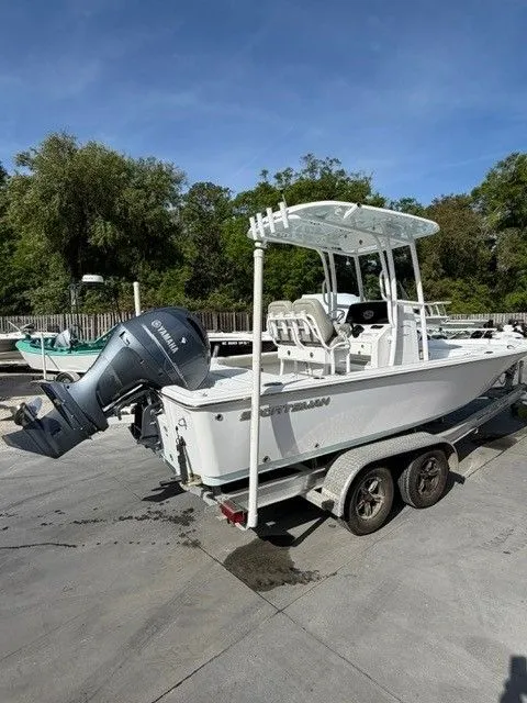 Slide: The Image of 2022 Sportsman Masters 227 Bay Boat on trailer outdoors. - 15