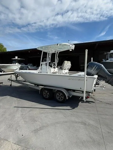 Slide: The Image of 2022 Sportsman Masters 227 Bay Boat on trailer outdoors. - 5