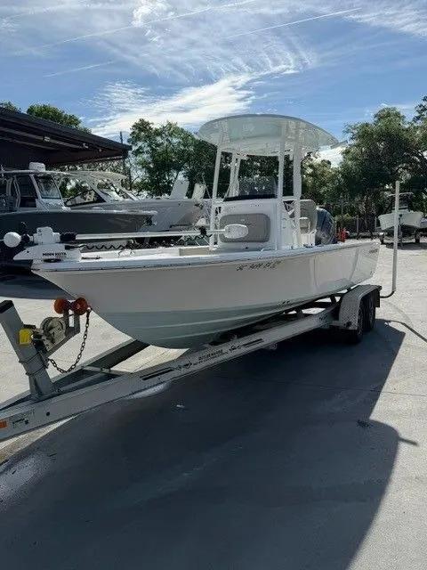 Slide: The Image of 2022 Sportsman Masters 227 Bay Boat on trailer outdoors. - 7