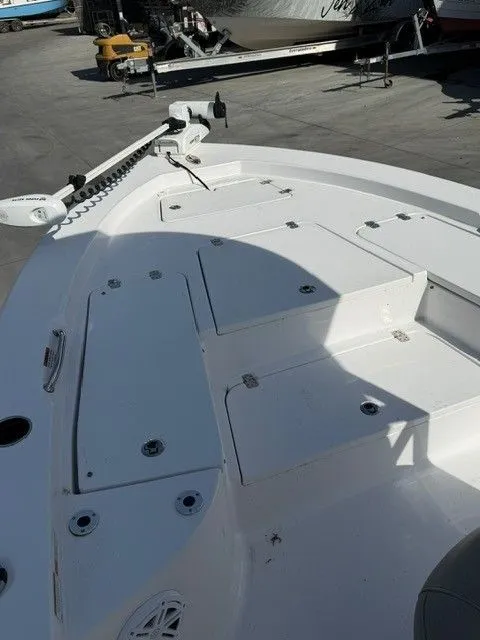 Slide: The Image of 2022 Sportsman Masters 227 Bay Boat front deck with storage compartments. - 8