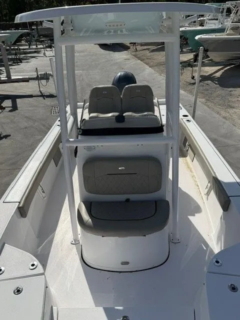 Slide: The Image of 2022 Sportsman Masters 227 Bay Boat with seating and helm station. - 9