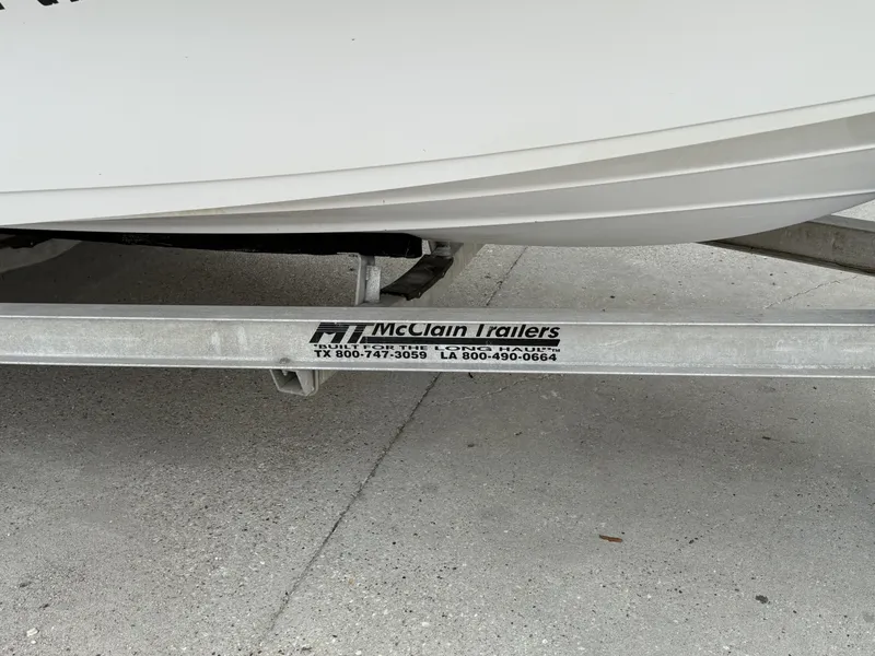 Slide: The Image of McClain trailer with Blue Wave 2000 PureBay boat, year 2015. - 16