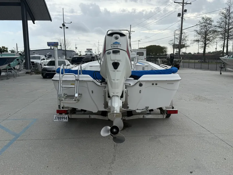 Slide: The Image of Rear view of a 2015 Blue Wave 2000 PureBay boat on a trailer. - 4