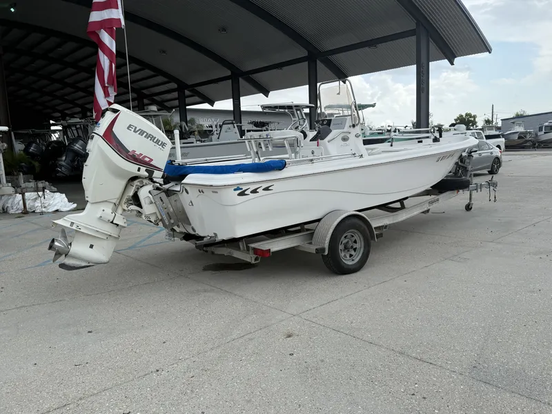 Slide: The Image of 2015 Blue Wave 2000 PureBay boat on trailer at marina. - 9