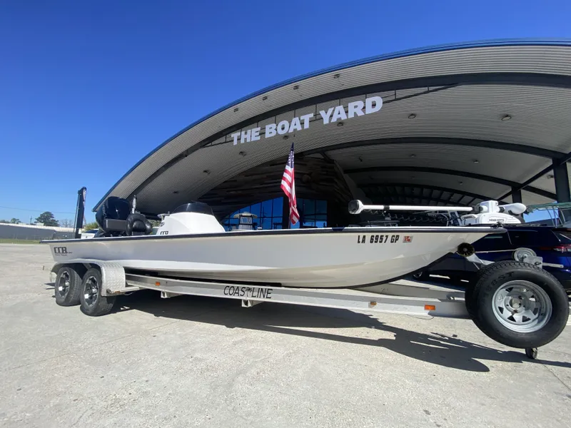 Slide: The Image of 2020 CCB 23' Fury boat on trailer at The Boat Yard. - 11