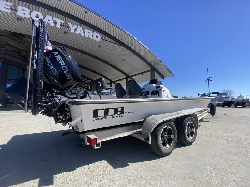 Slide: The Image of 2020 CCB 23' Fury boat at boat yard with Mercury engine. - 13