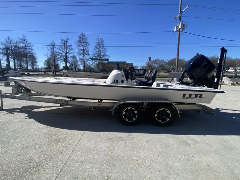 Slide: The Image of 2020 CCB Coastal Custom Boats 23' Fury on trailer. - 14