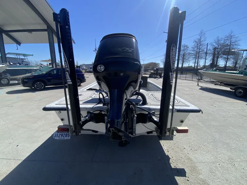 Slide: The Image of Rear view of a 2020 CCB Coastal Custom Boats 23' Fury. - 2