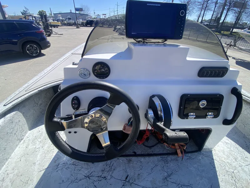 Slide: The Image of Helm console of a 2020 CCB Coastal Custom Boats 23' Fury. - 20