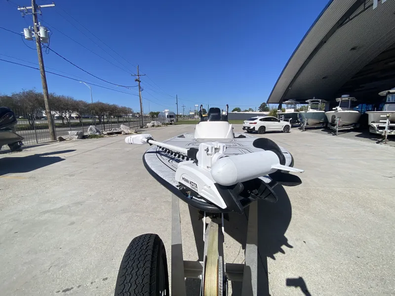 Slide: The Image of 2020 CCB Coastal Custom Boats 23' Fury on trailer outdoors. - 5