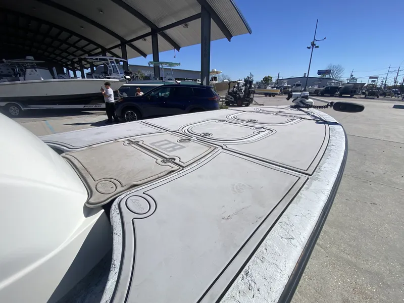 Slide: The Image of CCB Coastal Custom Boats 23' Fury, 2020 model on a parking lot. - 8