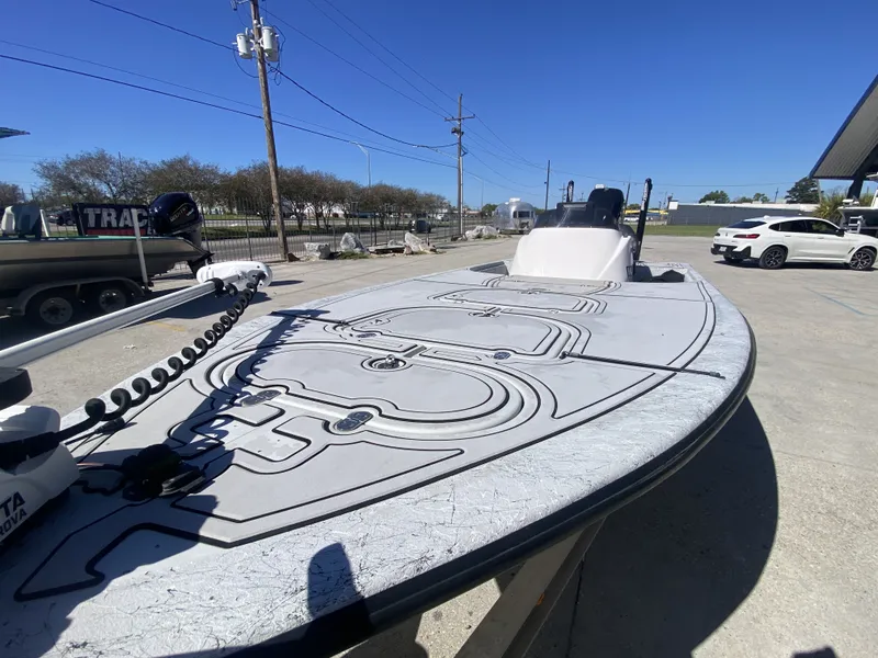 Slide: The Image of 2020 CCB Coastal Custom Boats 23' Fury on parking lot. - 9
