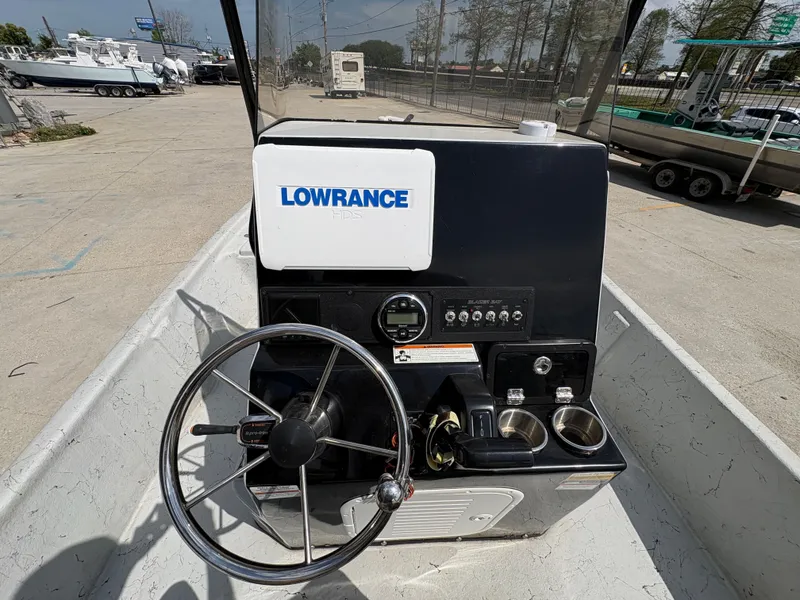 Slide: The Image of Steering console of a 2020 Blazer Bay 2170 boat. - 12