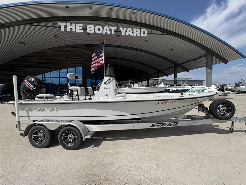 Slide: The Image of 2020 Blazer Bay 2170 boat on trailer at boatyard. - 14