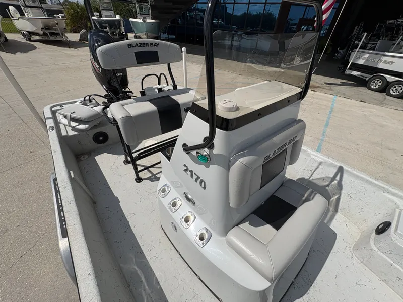 Slide: The Image of 2020 Blazer Bay 2170 boat with console and seating area. - 20