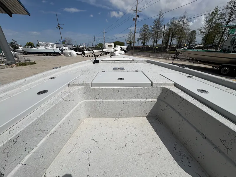 Slide: The Image of 2020 Blazer Bay 2170 boat on a parking lot under sunny skies. - 7