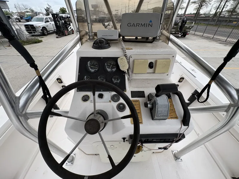 Slide: The Image of Console of a 2000 Kenner 21 CC boat with Garmin device. - 11