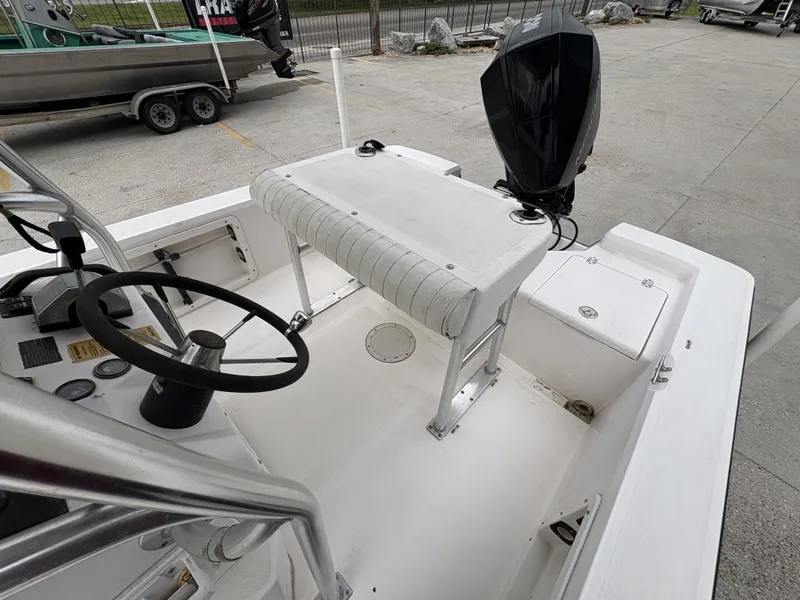 Slide: The Image of Interior view of a 2000 Kenner 21 CC boat. - 12