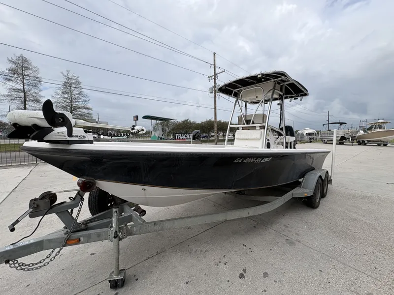Slide: The Image of 2000 Kenner 21 CC boat on trailer, side view. - 5