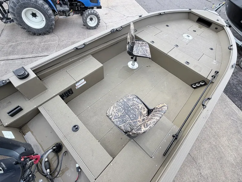 Slide: The Image of Interior view of a 2020 G3 Outfitter V177 T boat with two seats. - 14