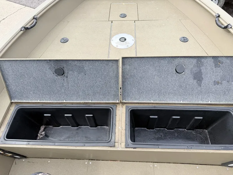 Slide: The Image of 2020 G3 Outfitter V177 T boat with open storage compartments. - 21