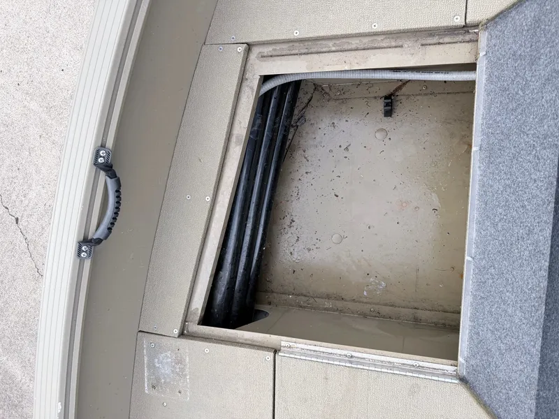 Slide: The Image of Open storage compartment in G3 Outfitter V177 T boat, 2020 model. - 5