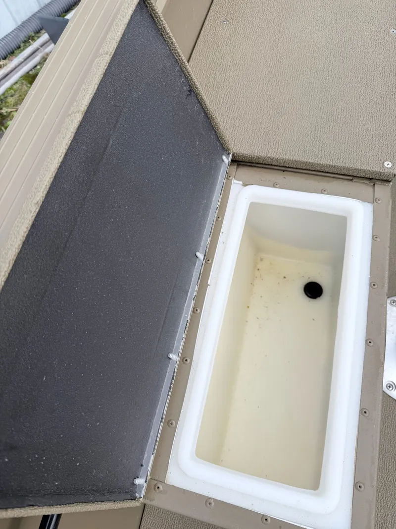 Slide: The Image of Open storage compartment in G3 Outfitter V177 T boat, 2020 model. - 7