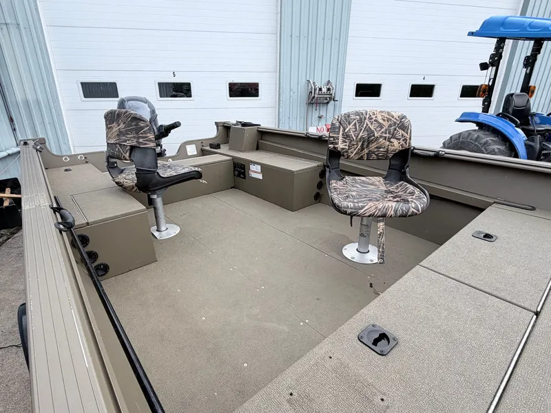 Slide: The Image of Interior of a 2020 G3 Outfitter V177 T boat with two seats. - 8