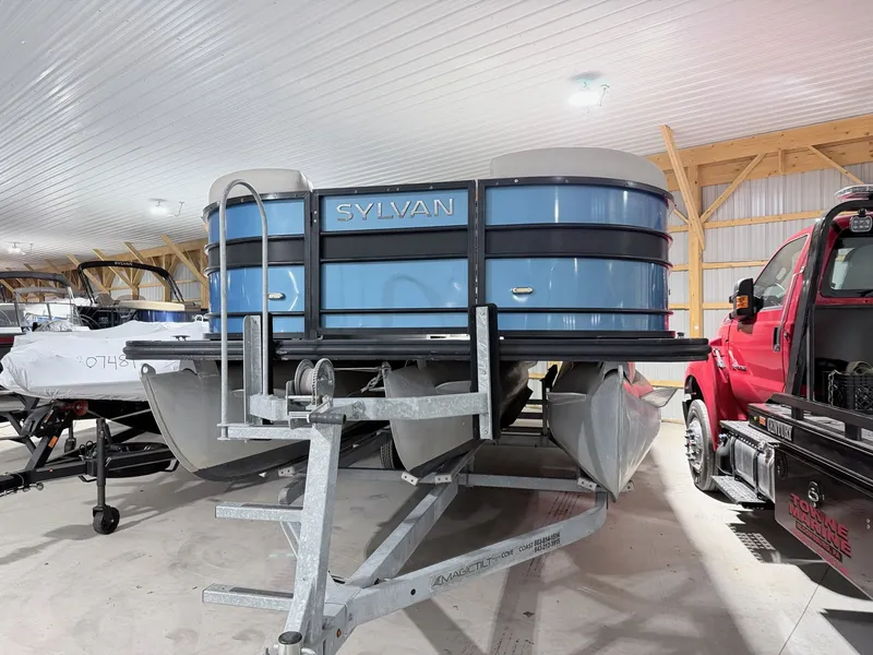 Slide: The Image of 2018 Sylvan 8522 LZ LES pontoon boat in storage facility. - 17