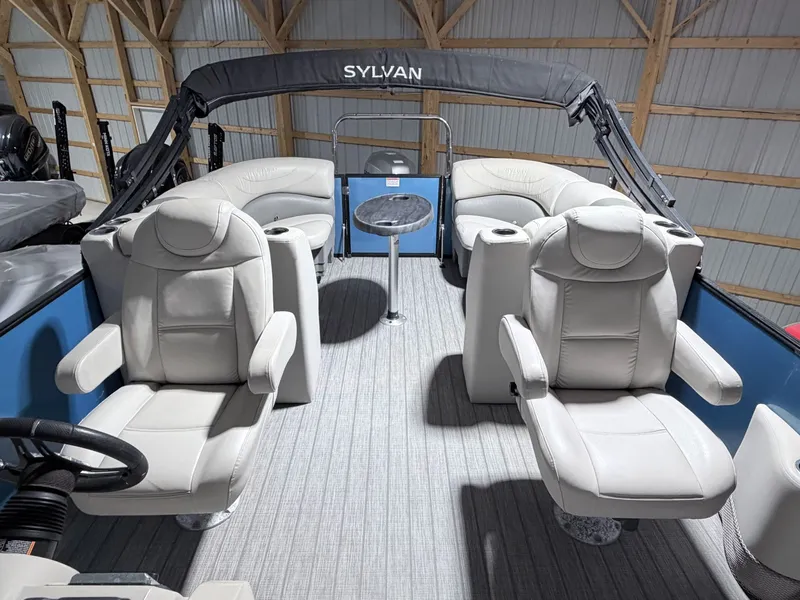 Slide: The Image of Interior of a 2018 Sylvan 8522 LZ LES pontoon boat with luxurious seating. - 2