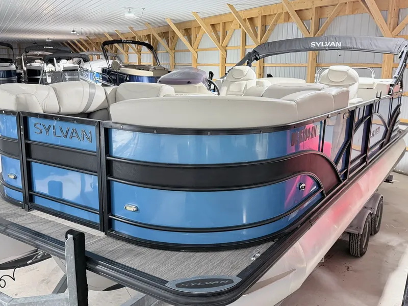 Slide: The Image of 2018 Sylvan 8522 LZ LES pontoon boat in storage facility. - 21