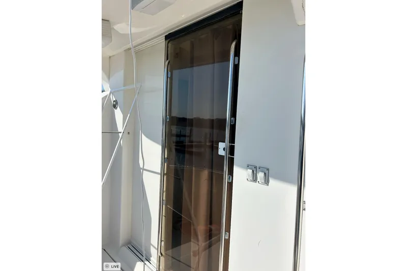 Slide: The Image of Sliding glass door on 2003 Silverton 330 Sport Bridge yacht. - 16