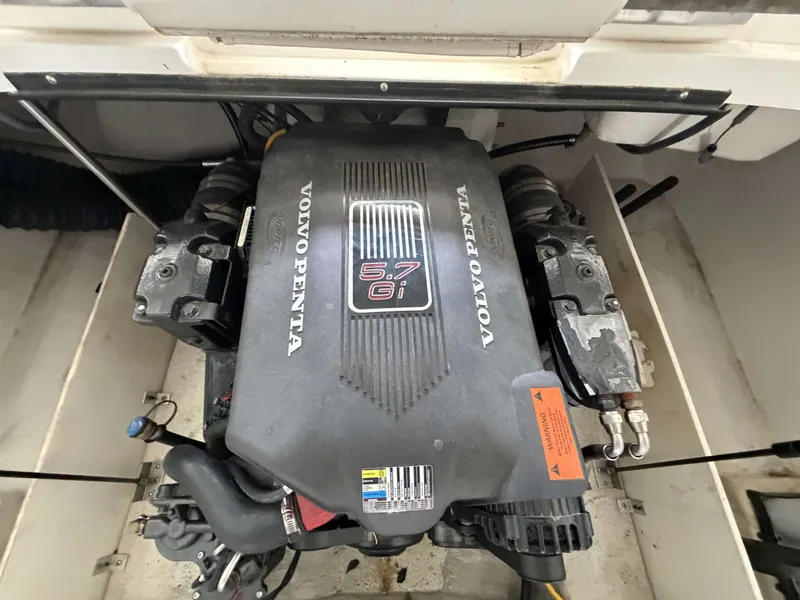 Slide: The Image of Volvo Penta 5.7 Gi engine in a 2004 Cobalt 220 boat. - 14