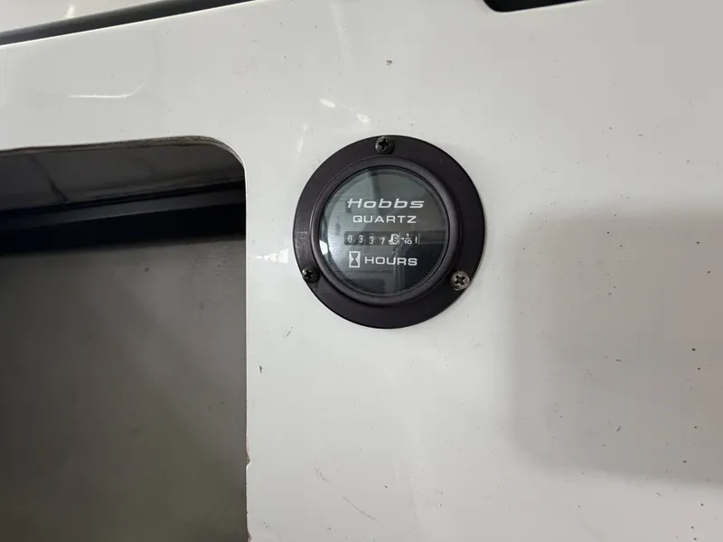 Slide: The Image of Hobbs hour meter on 2004 Cobalt 220 boat. - 17