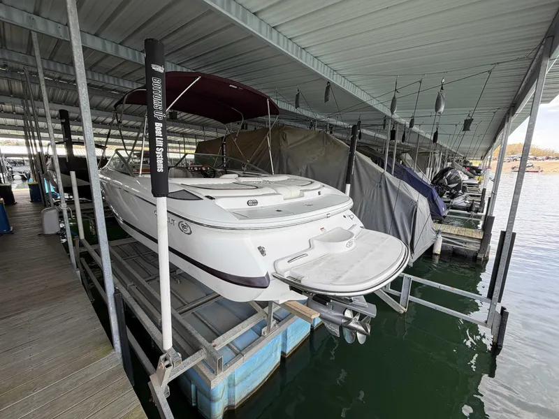 Slide: The Image of 2004 Cobalt 220 boat in covered dock. - 4